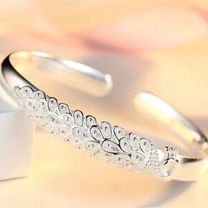 Elegant Silver Peacock Bracelet.